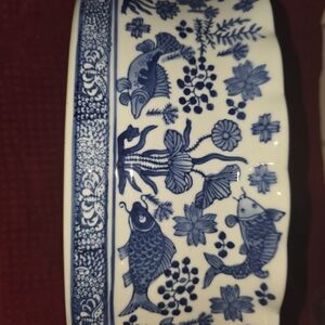 Blue and White Ceramic Bowl with Fish Design